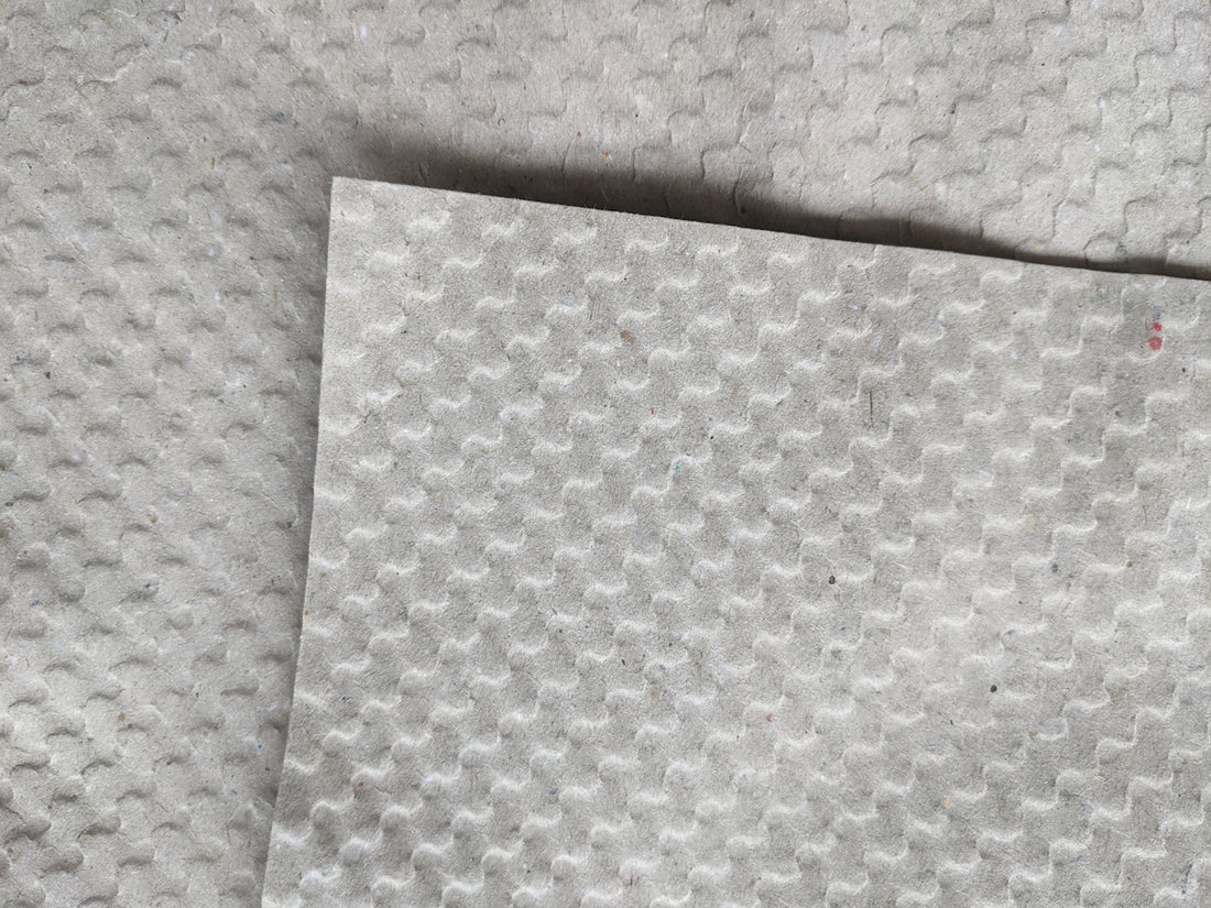white paper on white textile