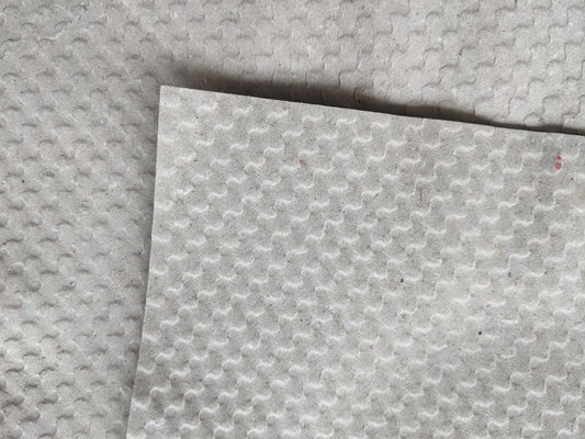 white paper on white textile